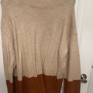 Women’s pullover tunic style sweater. Cream on top caramel on bottom. Size L